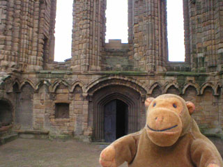 Mr Monkey outside the door of the Percy Chantry