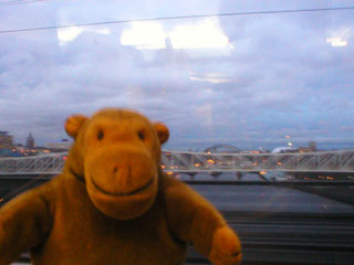 Mr Monkey crossing the Tyne by train