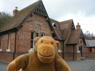 Mr Monkey outside the Victorian Board school