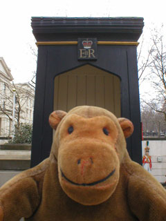 Mr Monkey with a sentry box outside the Guards Museum