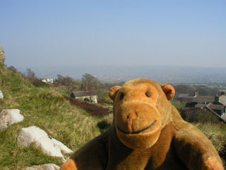 Mr Monkey looking down from Mow Cop