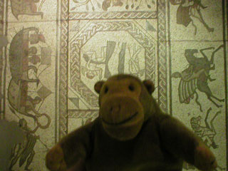 Mr Monkey in front of Roman mosaic