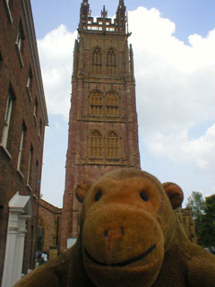 Mr Monkey looking at the tower of St Mary Magdalene