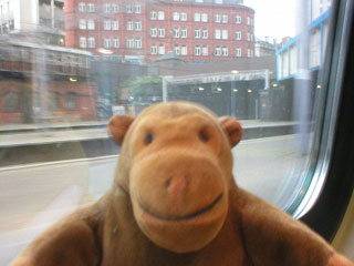 Mr Monkey on the train at Birmingham