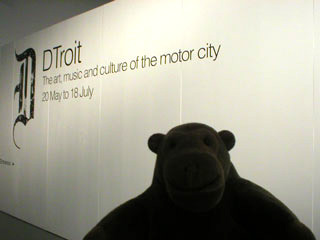 Mr Monkey outside the DTroit exhibition