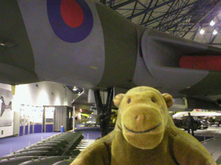 Mr Monkey in front of an Avro Vulcan