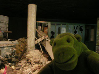 Mr Monkey in a wrecked machine shop