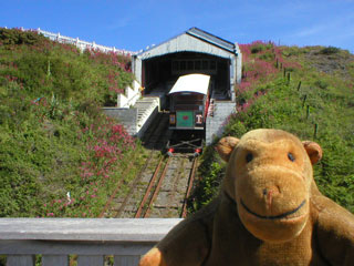 Mr Monkey in front of the top of the Cliff Railway