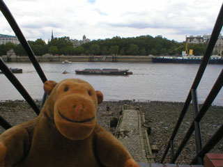 Mr Monkey by a jetty near the OXO tower