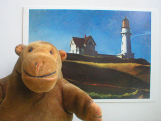 Mr Monkey in front of Hopper's Lighthouse Hill
