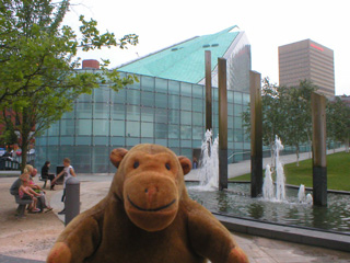 Mr Monkey looking across the fountains towards Urbis