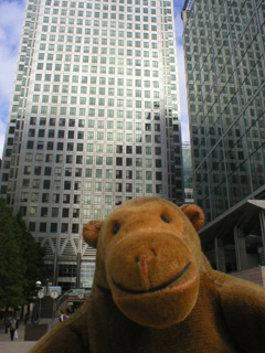 Mr Monkey outside an important financial building