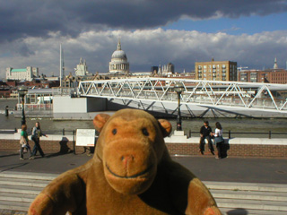 Mr Monkey looking off the balcony at the Globe's restaurant
