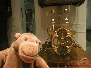 Mr Monkey with a replica John Harrison timepiece