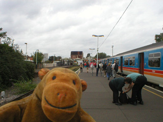 Mr Monkey on a station platform