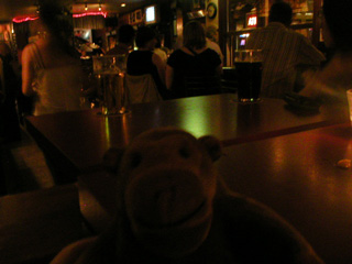 Mr Monkey sitting on a table in the Rex