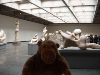 Mr Monkey looking at Henry Moore maquettes