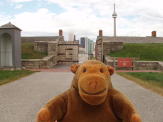 Mr Monkey outside the main gate of Fort York