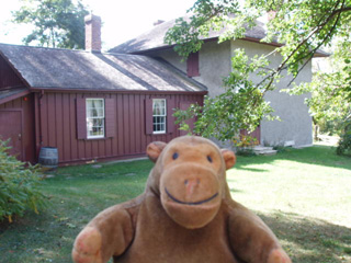 Mr Monkey beside the Helliwell House