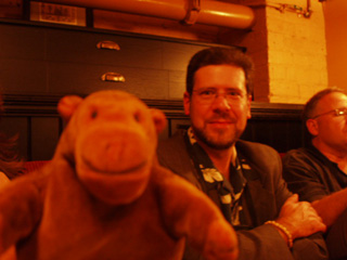 Mr Monkey at a table with Mr Sean