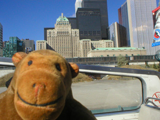 Mr Monkey looking at the Fairmont Royal York from a distance