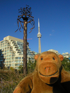 Mr Monkey in front of the Courante maypole