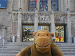 Mr Monkey outside the front doors of the Royal Ontario Museum