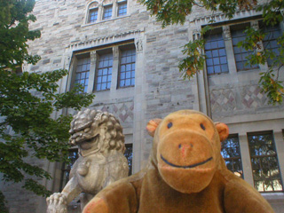 Mr Monkey with a stone lion-like creature outside the ROM