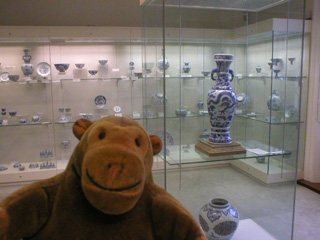 Mr Monkey in a room full of blue and white Chinese ceramics