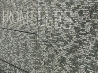 Close up of Australian war memorial, showing place names and the battle honour, Fromelles