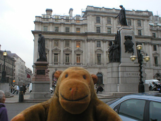 Mr Monkey looking at the Crimea memorial in Waterloo Place