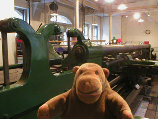 Mr Monkey examining the Kirkaldy testing machine