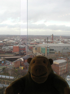 Mr Monkey looking down on the Triangle, Urbis, Chethams and Victoria station