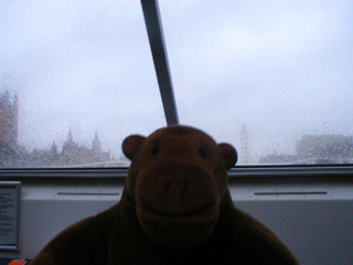 Mr Monkey aboard a catamaran on the Thames