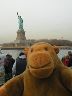 Mr Monkey in front the Statue of Liberty