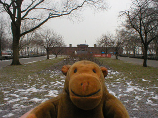 Mr Monkey with Castle Clinton in the distance