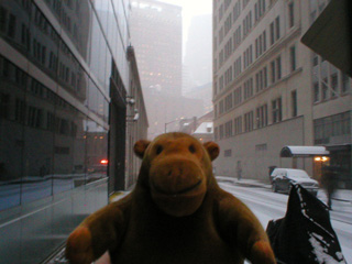 Mr Monkey on the snowy streets of Manhattan