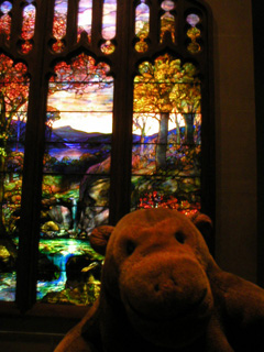 Mr Monkey in front of Tiffany's Autumn Landscape Triptych