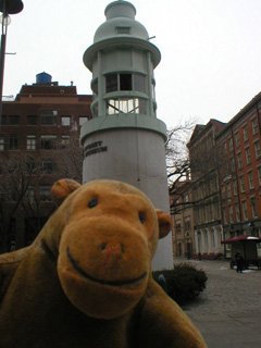 Mr Monkey in front of the Titanic Memorial lighthouse