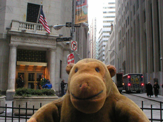 Mr Monkey in front of the New York Stock Exchange