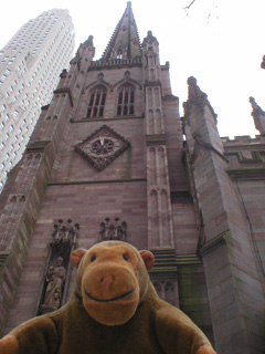 Mr Monkey looking up at the tower of Trinity Church
