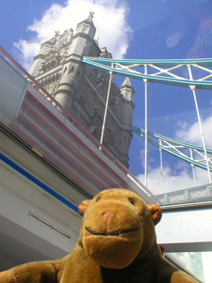 Mr Monkey Mr Monkey looking up at Tower Bridge through the roof of the boat