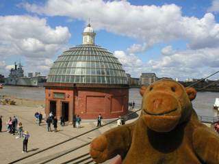Mr Monkey looking at the entrance to the Greenwich foot tunnel