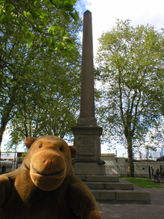 Mr Monkey looking at the Maori Wars monument