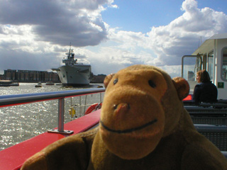Mr Monkey approaching an aircraft carrier