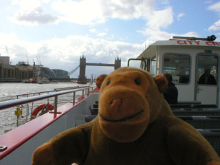 Mr Monkey looking up the river to Tower Bridge