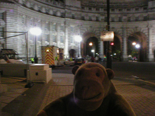 Mr Monkey looking at Admiralty Arch in the dark
