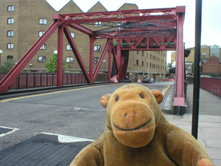 Mr Monkey crossing the Shadwell Basin bridge