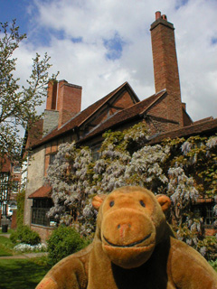 Mr Monkey looking at Nash's House from the garden