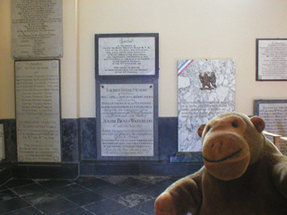 Mr Monkey with the memorials to dead officers